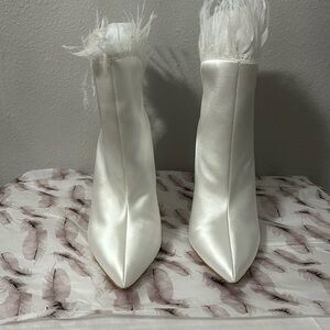 Women’s white ankle boots.
